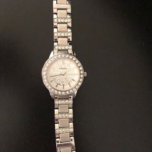 Women’s silver Fossil watch